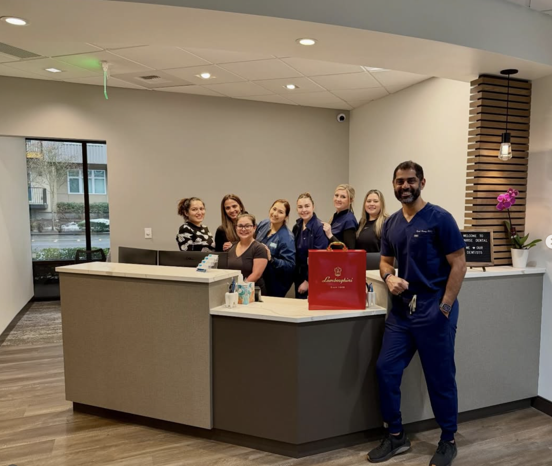 The Redmond Dental Studio team at the reception desk