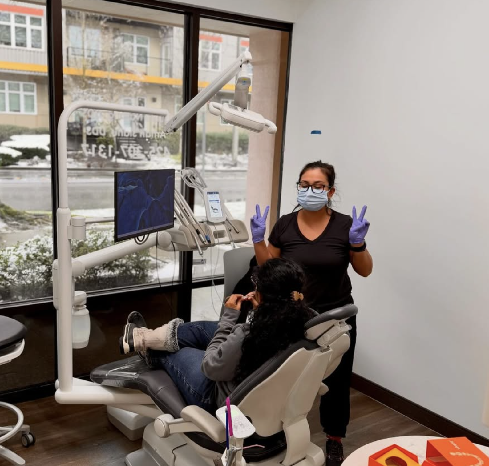 Your first visit to Redmond Dental Studio — hygienist with patient